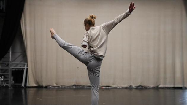 French dancer Laura Patay, who was born without the lower half of her left arm practices for the company’s new show. Despite Candoco’s success, Patay is frustrated that disabled people are rarely visible in the cultural sphere. “There’s been some progress, of course, but there is still a long way to go,” she said. (Antoine Pollez / AFP) French dancer Laura Patay, who was born without the lower half of her left arm practices for the company’s new show. Despite Candoco’s success, Patay is frustrated that disabled people are rarely visible in the cultural sphere. “There’s been some progress, of course, but there is still a long way to go,” she said. (Antoine Pollez / AFP)