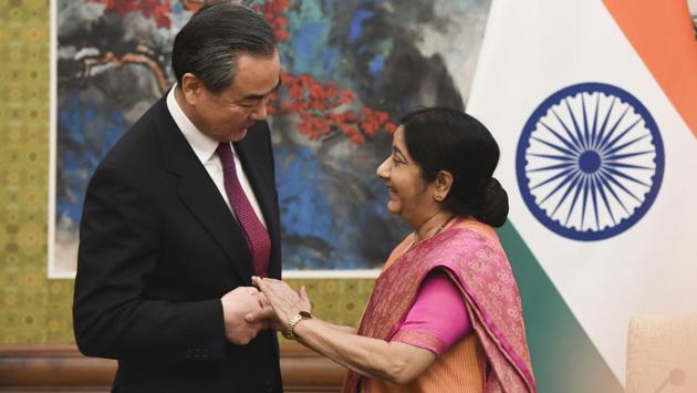 Indian Foreign Minister Sushma Swaraj (R) and Chinese Foreign Minister Wang Yi share a moment before a press conference, following their meeting at the Diaoyutai State Guest House in Beijing, China on April 22, 2018. (Madoka Ikegami / AP) Indian Foreign Minister Sushma Swaraj (R) and Chinese Foreign Minister Wang Yi share a moment before a press conference, following their meeting at the Diaoyutai State Guest House in Beijing, China on April 22, 2018. (Madoka Ikegami / AP)