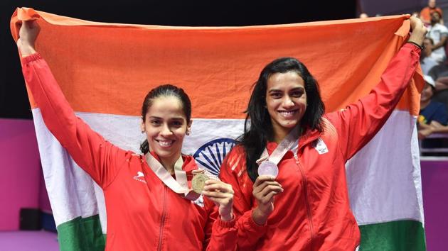 2018 Commonwealth Games gold medallists Saina Nehwal and PV Sindhu progressed to the women’s singles quarter-finals of Asia Badminton Championship in Wuhan, China on Thursday.(PTI)