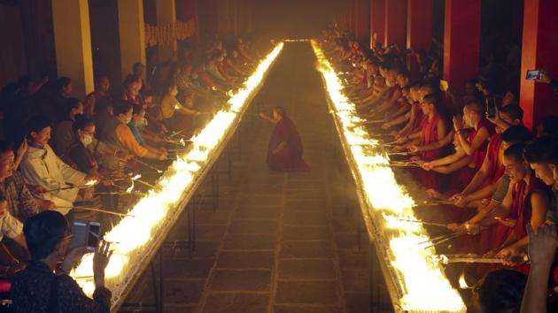 Members of Tashi Lhunpo Monastery and Students for a Free Tibet light candles on the birthday of 11th Panchen Lama as they attempt the world record for most lit candles on a birthday cake at the Tashi Lhunpo Monastery in Karnataka on April 25, 2018. (Tenzin Kalden / AP) Members of Tashi Lhunpo Monastery and Students for a Free Tibet light candles on the birthday of 11th Panchen Lama as they attempt the world record for most lit candles on a birthday cake at the Tashi Lhunpo Monastery in Karnataka on April 25, 2018. (Tenzin Kalden / AP)
