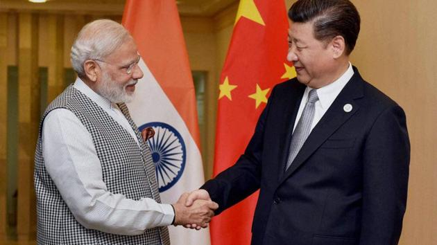 Prime Minister Narendra Modi shakes hands with Chinese President Xi Jinping during a meeting in Tashkent on the sidelines of SCO Summit.(PTI File Photo)