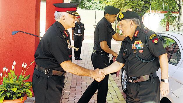 General Bipin Rawat,chief of Army staff, being received by Lt Gen D R Soni(left), general officer commanding-in-chief , Southern Command, on Thursday.(HT PHOTO)