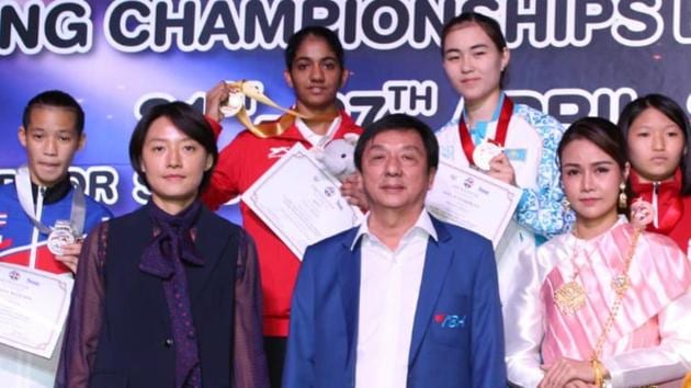 Nitu Ghanghas (centre), a world youth gold medallist, defeated Thailand’s Nillada Meekoon by a unanimous decision to seal gold in 48kg women’s category of the Asian Youth boxing championship.(HT Photo)