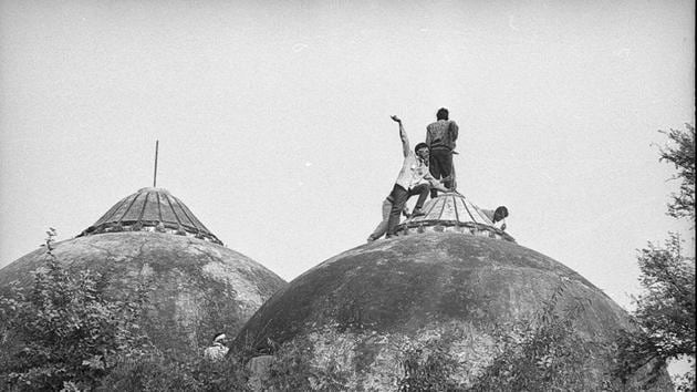 People climbing Babri Masjid in Ayodhya, Uttar Pradesh on December 6, 1992(File Photo)