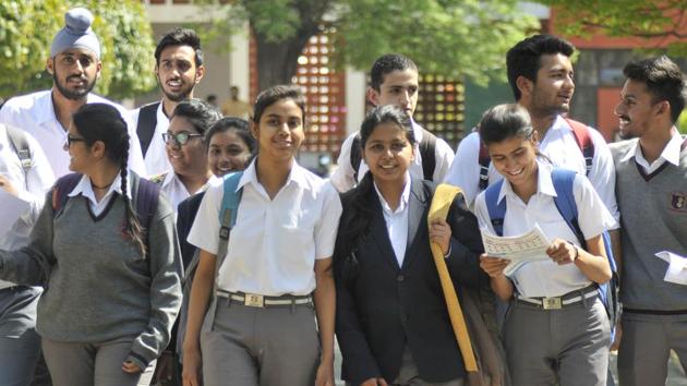 Students coming out of an examination centre in Chandigarh.(HT File)