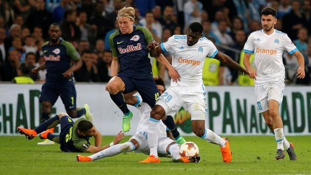 RB Salzburg's Xaver Schlager in action with Marseille's Andre-Frank Zambo Anguissa in the Europa League semi-final first leg at the Orange Velodrome in Marseille on Thursday.(Reuters)