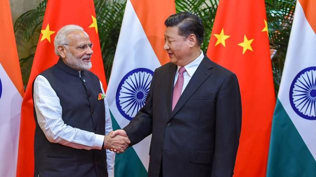 Prime Minister Narendra Modi shakes hands with Chinese President Xi Jinping in Wuhan on April 27. (PTI Photo) Prime Minister Narendra Modi shakes hands with Chinese President Xi Jinping in Wuhan on April 27. (PTI Photo)