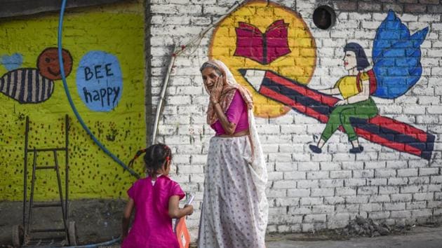 The idea behind the event ‘Colours of Sanjay Camp’ was to colour and re-energize the slums of Sanjay Camp with social messages which then becomes a part of the residents’ daily lives. Walls were covered with messages on emotions, UN sustainable goals, gender equality, diversity, women empowerment, education, and family cohesiveness. (Burhaan Kinu / HT Photo) The idea behind the event ‘Colours of Sanjay Camp’ was to colour and re-energize the slums of Sanjay Camp with social messages which then becomes a part of the residents’ daily lives. Walls were covered with messages on emotions, UN sustainable goals, gender equality, diversity, women empowerment, education, and family cohesiveness. (Burhaan Kinu / HT Photo)