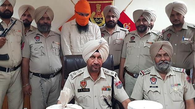 Accused Amandeep Singh in Police custody. (HT Photo) Accused Amandeep Singh in Police custody. (HT Photo)