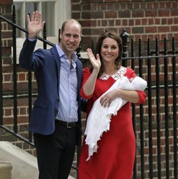 British royals William and Kate wave to photographers hours after the birth of their third child.(Tim Ireland / AP Photo)
