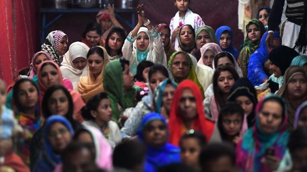 Devotees listen to the Sabri brothers during an event in Karachi. Sectarian militants have targeted Sufis for years. Just months after Sabri was killed, IS claimed back-to-back attacks on shrines in the provinces of Balochistan and Sindh that killed more than 100 people combined. Earlier this month, the military approved death sentences for two militants linked to Sabri’s killing.  (Asif Hassan / AFP) 