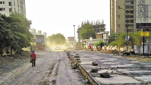 A visit to the area revealed that the necessary safety traffic signs, ‘work in progress’ signboards and traffic barriers were not present. Iron rods were also found protruding from the incomplete stretch of the road from Raheja Vista till Ganga Florentina, which posed a serious threat to commuters safety while using the road. (HT PHOTO) A visit to the area revealed that the necessary safety traffic signs, ‘work in progress’ signboards and traffic barriers were not present. Iron rods were also found protruding from the incomplete stretch of the road from Raheja Vista till Ganga Florentina, which posed a serious threat to commuters safety while using the road. (HT PHOTO)