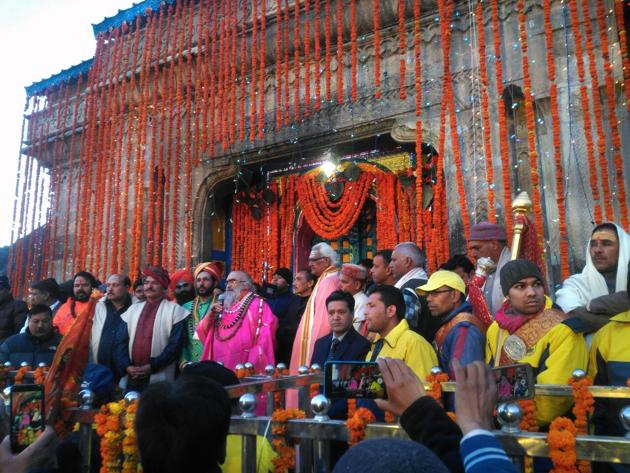 More than 5,000 devotees were present when the main gates of Kedarnath shrine were opened by the chief priest on Sunday.(HT Photo) More than 5,000 devotees were present when the main gates of Kedarnath shrine were opened by the chief priest on Sunday.(HT Photo)
