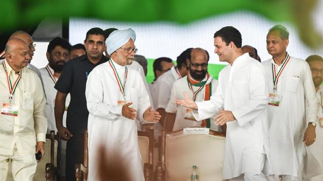 Congress President Rahul Gandhi interacts with former Prime Minister Dr Manmohan Singh during 'Jan Akrosh Rally', in New Delhi on Sunday. (PTI Photo) Congress President Rahul Gandhi interacts with former Prime Minister Dr Manmohan Singh during 'Jan Akrosh Rally', in New Delhi on Sunday. (PTI Photo)