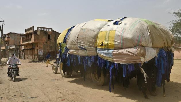 Garg recalls older times when Panipat’s roads would be blocked by lines of trucks, carrying tonnes of clothes to the factories. The trucks can still be seen, but they don’t cause traffic jams anymore. Ironically, 50 years back it was theses low-cost alternatives which helped Panipat acquire the castoff capital title from Prato, an industrial city in Italy. (Vipin Kumar / HT Photo) 
