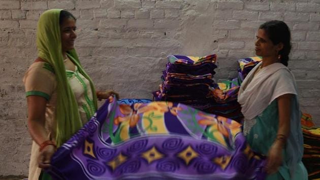 Workers fold fleece blankets at a factory in Panipat. The local fleece blanket industry also faces competition from imported Chinese blankets. “But as the quality is almost the same, the competition is healthy,” Bansal said. “We also don’t do year-round production any more. Our production cycle goes from August to January, to coincide with winter demand.” (Vipin Kumar / HT Photo) 