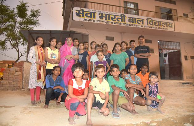 Vimala Kumawat with students at Seva Bharti Bal Vidyalay in Jaipur. When Kumawat, 64, decided to educate ragpicker children, she never imagined that 15 years later it would evolve into a school with 450 students. (Prabhakar Sharma/HT Photo) Vimala Kumawat with students at Seva Bharti Bal Vidyalay in Jaipur. When Kumawat, 64, decided to educate ragpicker children, she never imagined that 15 years later it would evolve into a school with 450 students. (Prabhakar Sharma/HT Photo)