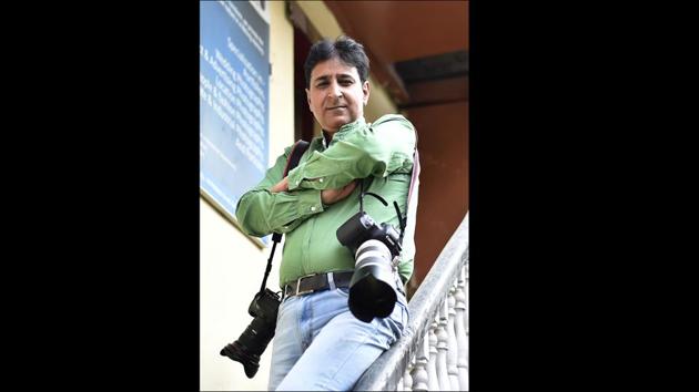 Former Reuters photographer Fayaz Kabli at his office in Srinagar. “So it was politics that came first, not the gun. The Kashmiri story so far is the gun came to the Valley and it changed everything. The gun became the news point and the photograph sought in Kashmir post the ’90s,” said Kabli, who now teaches photojournalism in a school in Srinagar. (Ajay Aggarwal / HT Photo) Former Reuters photographer Fayaz Kabli at his office in Srinagar. “So it was politics that came first, not the gun. The Kashmiri story so far is the gun came to the Valley and it changed everything. The gun became the news point and the photograph sought in Kashmir post the ’90s,” said Kabli, who now teaches photojournalism in a school in Srinagar. (Ajay Aggarwal / HT Photo)