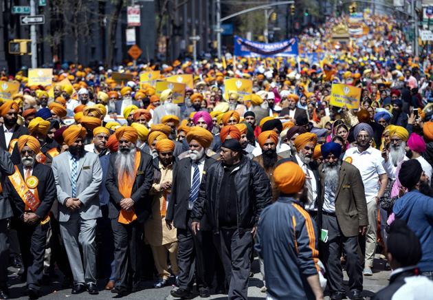 Men, women and children, dressed in their traditional finery, turned out in large numbers for the 31st ‘Sikh Day Parade’ on Saturday, inundating Manhattan with a sea of turbans. (AP)