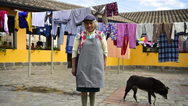 Delia Veloz’s hands have almost lost their fingerprints from the constantly rubbing dirty clothes against rough stones at an old public laundry in Quito, Equador. The 74-year-old is one of few people left in Ecuador who still undertake the demanding work of a washerwoman -- a trade which is increasingly rare due to the widespread use of domestic washing machines. (Rodrigo Buendia / AFP)