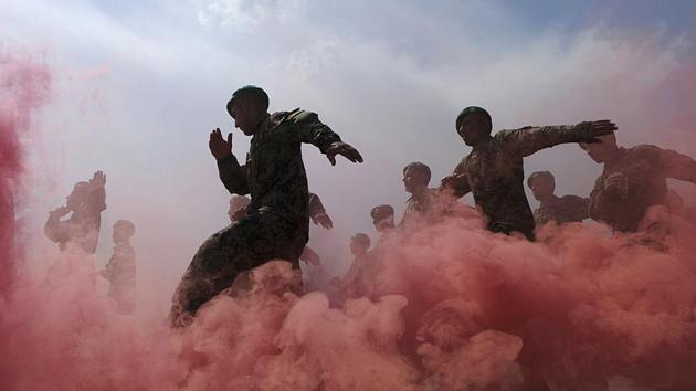 Afghan National Army (ANA) officers march during a graduation ceremony at the Ghazi Military Training Centre in Kabul on March 31, 2011. In 2002 he became a full-time photo stringer, rising through the ranks to become chief photographer in the bureau. (Shah Marai / AFP File) Afghan National Army (ANA) officers march during a graduation ceremony at the Ghazi Military Training Centre in Kabul on March 31, 2011. In 2002 he became a full-time photo stringer, rising through the ranks to become chief photographer in the bureau. (Shah Marai / AFP File)