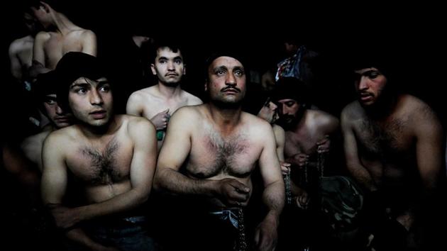 Afghan men hold chains as they wait to take part in ritual self-flagellation to celebrate the Muslim festival of Ashura, at a mosque in Kabul on January 15, 2008. Marai’s images capture not just Afghanistan’s long-running conflict but also the joys and struggles of tumultuous daily life. (Shah Marai / AFP File) Afghan men hold chains as they wait to take part in ritual self-flagellation to celebrate the Muslim festival of Ashura, at a mosque in Kabul on January 15, 2008. Marai’s images capture not just Afghanistan’s long-running conflict but also the joys and struggles of tumultuous daily life. (Shah Marai / AFP File)