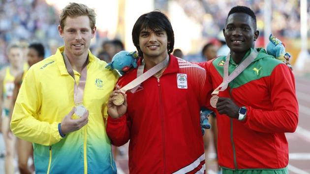 There was rare track-and-field success for India this month at the Carrara Stadium at Gold Coast when the 20-year-old Neeraj Chopra (C) won the javelin at the Commonwealth Games 2018.(REUTERS)