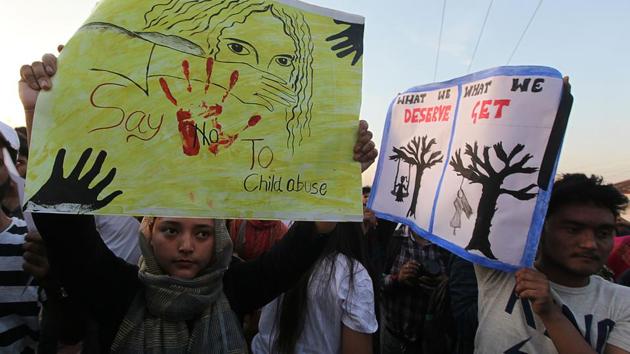 Demonstrators hold placards during a protest against the rape of an eight-year-old girl in Jammu. (AFP File Photo/Representative image) Demonstrators hold placards during a protest against the rape of an eight-year-old girl in Jammu. (AFP File Photo/Representative image)