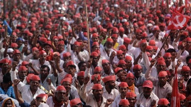 Farmers shout slogans during a rally at the end of their six-day-long march on foot, in Mumbai, on March 12. (AP Photo)