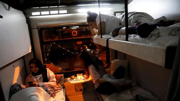 Busra Korkmaz (L), Ozlem Ozderya (R), and Berfin Abadan (R top), chat onboard the Eastern Express travelling through Kayseri province. The train sets off from Ankara every day for Kars, near the Armenian border. It travels through Anatolian provinces such as Kayseri, Sivas, Erzincan and Erzurum and reaches its destination some 24 hours and 30 minutes later. (Umit Bektas / REUTERS) Busra Korkmaz (L), Ozlem Ozderya (R), and Berfin Abadan (R top), chat onboard the Eastern Express travelling through Kayseri province. The train sets off from Ankara every day for Kars, near the Armenian border. It travels through Anatolian provinces such as Kayseri, Sivas, Erzincan and Erzurum and reaches its destination some 24 hours and 30 minutes later. (Umit Bektas / REUTERS)
