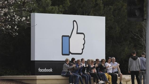 Tourists at Facebook’s headquarters, Menlo Park, California. Mark Zuckerberg also built Facebook by imitating MySpace and Friendster, and he continues to copy products(NYT)