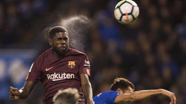 FC Barcelona's Samuel Umtiti wins an aerial ball during the Spanish La Liga match against Deportivo La Coruna. (AP) FC Barcelona's Samuel Umtiti wins an aerial ball during the Spanish La Liga match against Deportivo La Coruna. (AP)