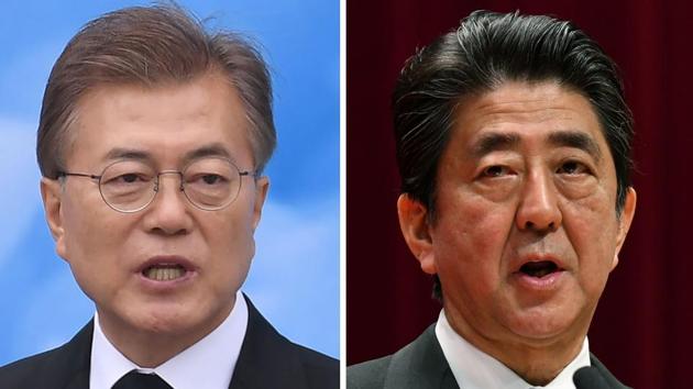 South Korean President Moon Jae-in (left) will travel to Tokyo next week for a three-way summit with Japanese Prime Minister Shinzo Abe (right) and China's Premier Li Keqiang. (AFP File Photo) South Korean President Moon Jae-in (left) will travel to Tokyo next week for a three-way summit with Japanese Prime Minister Shinzo Abe (right) and China's Premier Li Keqiang. (AFP File Photo)
