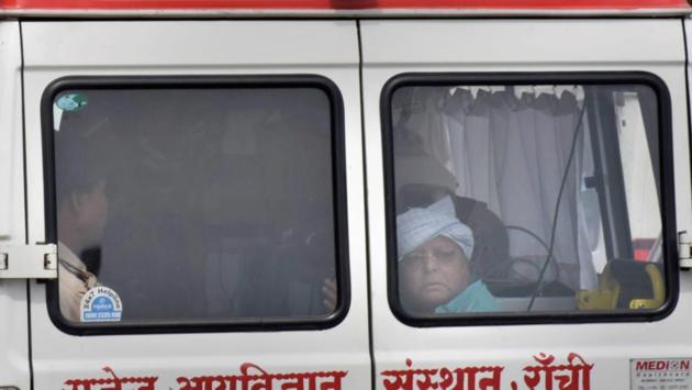 Rashtriya Janata Dal (RJD) chief Lalu Prasad Yadav amid heavy security arrives in Ranchi on Tuesday. Yadav, serving a jail term in the fodder scam left AIIMS yesterday after being discharged by the hospital, which said his condition had improved significantly. (PTI) Rashtriya Janata Dal (RJD) chief Lalu Prasad Yadav amid heavy security arrives in Ranchi on Tuesday. Yadav, serving a jail term in the fodder scam left AIIMS yesterday after being discharged by the hospital, which said his condition had improved significantly. (PTI)
