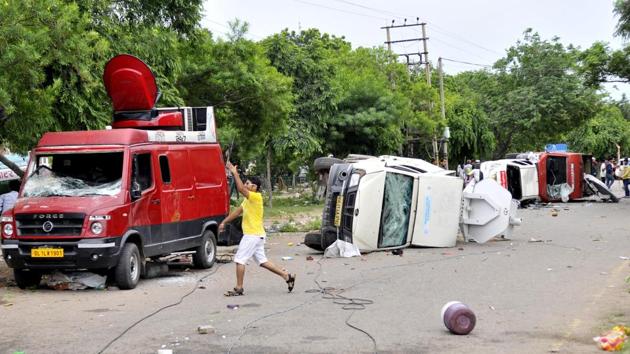 Dera Sacha Sauda chief Gurmeet Ram Rahim’s conviction in two rape cases on August 25 last year had triggered arson and violence across Haryana that claimed 36 lives and left 250 people injured. Panchkula witnessed its worst violence to date.(HT File)