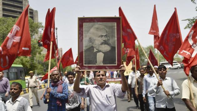 Members of the Indian Federation of Trade Unions take part in a protest march on Labour Day in New Delhi, on Tuesday. (Ravi Choudhary / PTI) Members of the Indian Federation of Trade Unions take part in a protest march on Labour Day in New Delhi, on Tuesday. (Ravi Choudhary / PTI)