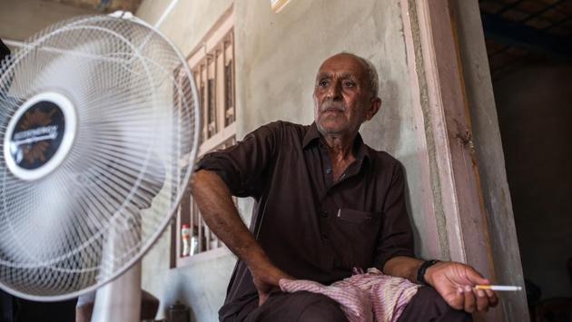 A man sits next to a solar-powered fan in Goth Gul Muhammad Rao village, Sindh. Deficient generation and distribution take an estimated 2 percentage points off Pakistan’s economic growth annually and faults in the national grid are exposed as demand increases in summer. Even Karachi, the financial hub of the country isn’t spared from hours long cuts. (Asim Hafeez / Bloomberg) A man sits next to a solar-powered fan in Goth Gul Muhammad Rao village, Sindh. Deficient generation and distribution take an estimated 2 percentage points off Pakistan’s economic growth annually and faults in the national grid are exposed as demand increases in summer. Even Karachi, the financial hub of the country isn’t spared from hours long cuts. (Asim Hafeez / Bloomberg)