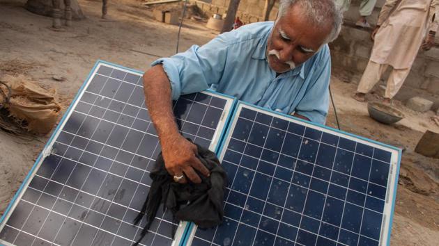 Part of the problem is an imbalanced payments system among power suppliers leading to so-called circular debt. Government-mandated tariffs don’t recoup costs and subsidies are rarely paid on time, according to a report from the Asian Development Bank. And customers are discovering that off-grid solar may be the answer. (Asim Hafeez / Bloomberg) Part of the problem is an imbalanced payments system among power suppliers leading to so-called circular debt. Government-mandated tariffs don’t recoup costs and subsidies are rarely paid on time, according to a report from the Asian Development Bank. And customers are discovering that off-grid solar may be the answer. (Asim Hafeez / Bloomberg)