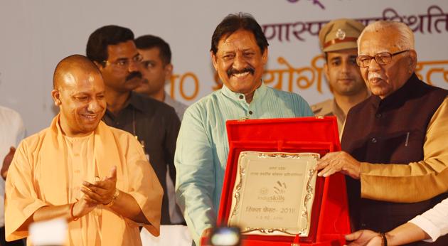 Chief Minister Yogi Adityanath with sports minister Chetan Chauhan and Governor Ram Naik at the event in Lucknow. (Subhankar Chakraborty/HT Photo) Chief Minister Yogi Adityanath with sports minister Chetan Chauhan and Governor Ram Naik at the event in Lucknow. (Subhankar Chakraborty/HT Photo)