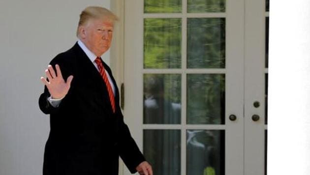 US President Donald Trump arrives to present the Commander-in-Chief's Trophy to the US Military Academy football team during a ceremony in the Rose Garden of the White House in Washington. (Reuters File Photo) US President Donald Trump arrives to present the Commander-in-Chief's Trophy to the US Military Academy football team during a ceremony in the Rose Garden of the White House in Washington. (Reuters File Photo)