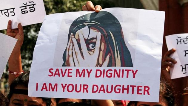 Social activists hold a protest against anti-women crimes in Amritsar.(REUTERS File) Social activists hold a protest against anti-women crimes in Amritsar.(REUTERS File)