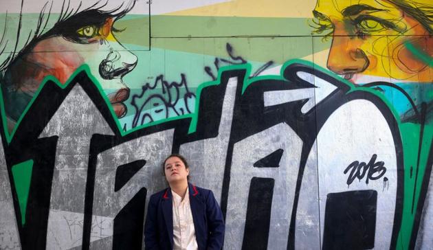 Tamara of the Chilean music group ‘Rough Bunnies’, a K-Pop band which pays tribute to South Korean band BAP, poses for a picture in Santiago. As embassies around the world stage early competition rounds ahead of the 2018 K-Pop World Festival, thousands of teenagers have been out practicing their moves, with the local winners invited to join the final in South Korea. (Claudio Reyes / AFP)