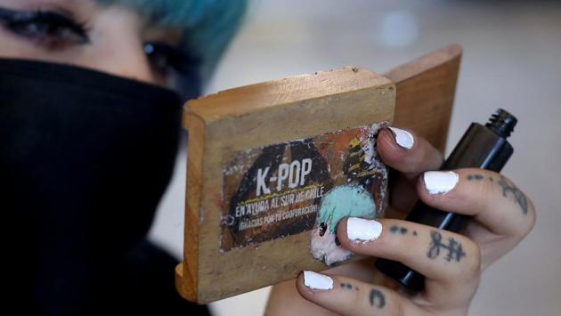 K-pop mania really took off in Chile in 2012 following the explosive success of ‘Gangnam Style,’ the wacky hit which transformed rapper/singer Psy into an international sensation. Taking the country by storm, the genre inspired the creation of local bands such as Rough Bunnies, which emerged in 2014 after K-pop boy band BAP (Best Absolute Perfect) cancelled a concert there. (Claudio Reyes / AFP)