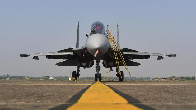 An Indian Air Force (IAF) Sukhoi fighter jet, developed by Sukhoi Aviation Holding Co., sits on the tarmac at the Kalaikunda Air Force Station, West Bengal, India.(Anindito Mukherjee/Bloomberg)