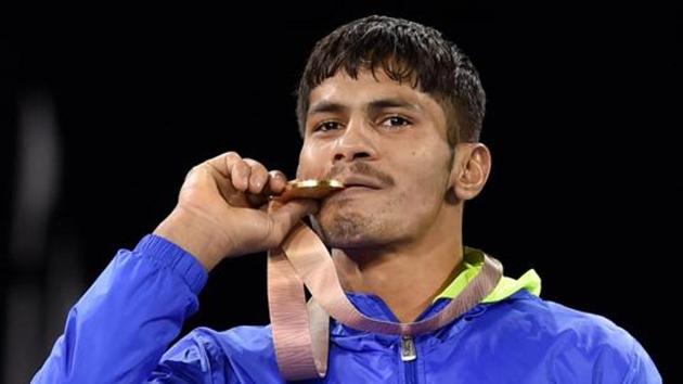 Gold medallist India's Rahul Aware during the medal ceremony of men's freestyle 57kg wrestling final at the Commonwealth Games 2018 in Gold Coast, on Thursday.(PTI File Photo)