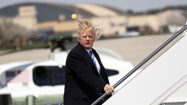US President Donald Trump boards Air Force One before departing Joint Base Andrews, Maryland en route West Virginia, US, April 5, 2018.(REUTERS File Photo)