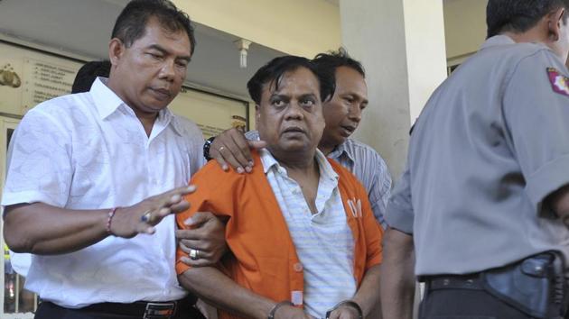 Police escort Chhota Rajan at police headquarters in Denpasar, Bali November 2, 2015. Rajan was deported from Indonesia’s Bali in November 2015 and subsequently made an accused in the J Dey murder case.(REUTERS File)