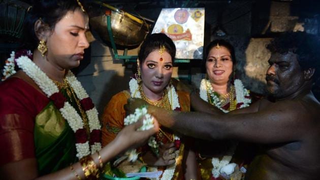 A Hindu priest embodying Aravan performs the marriage at the Koothandavar temple. According to the Mahabharata, Aravan agreed to be sacrificed to the goddess Kali in order to ensure the Pandava’s success in the battlefield against the Kauravas, under the condition that he is married before he dies. (Arun Sankar / AFP)