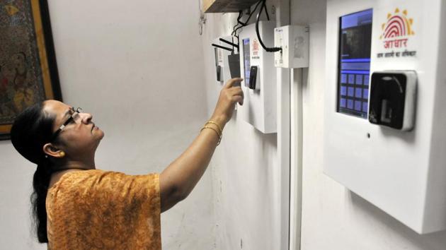 Employees mark their attendance through an Aadhaar-based system in the Planning Commission. (Vipin Kumar/HT File Photo) Employees mark their attendance through an Aadhaar-based system in the Planning Commission. (Vipin Kumar/HT File Photo)