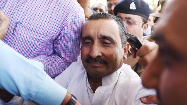 BJP MLA Kuldeep Sengar reacts after being produced in a Lucknow court in connection with the Unnao rape case on April 14, 2018.(Subhankar Chakraborty/HT PHOTO)